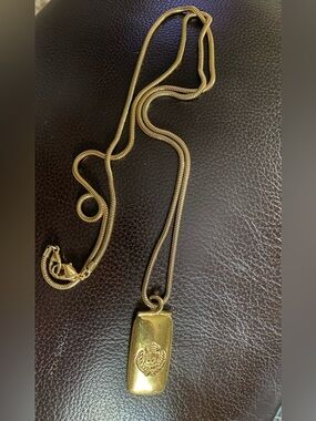 Vintage Liz Claiborne Gold Tone Pendant Necklace with Crest Detail